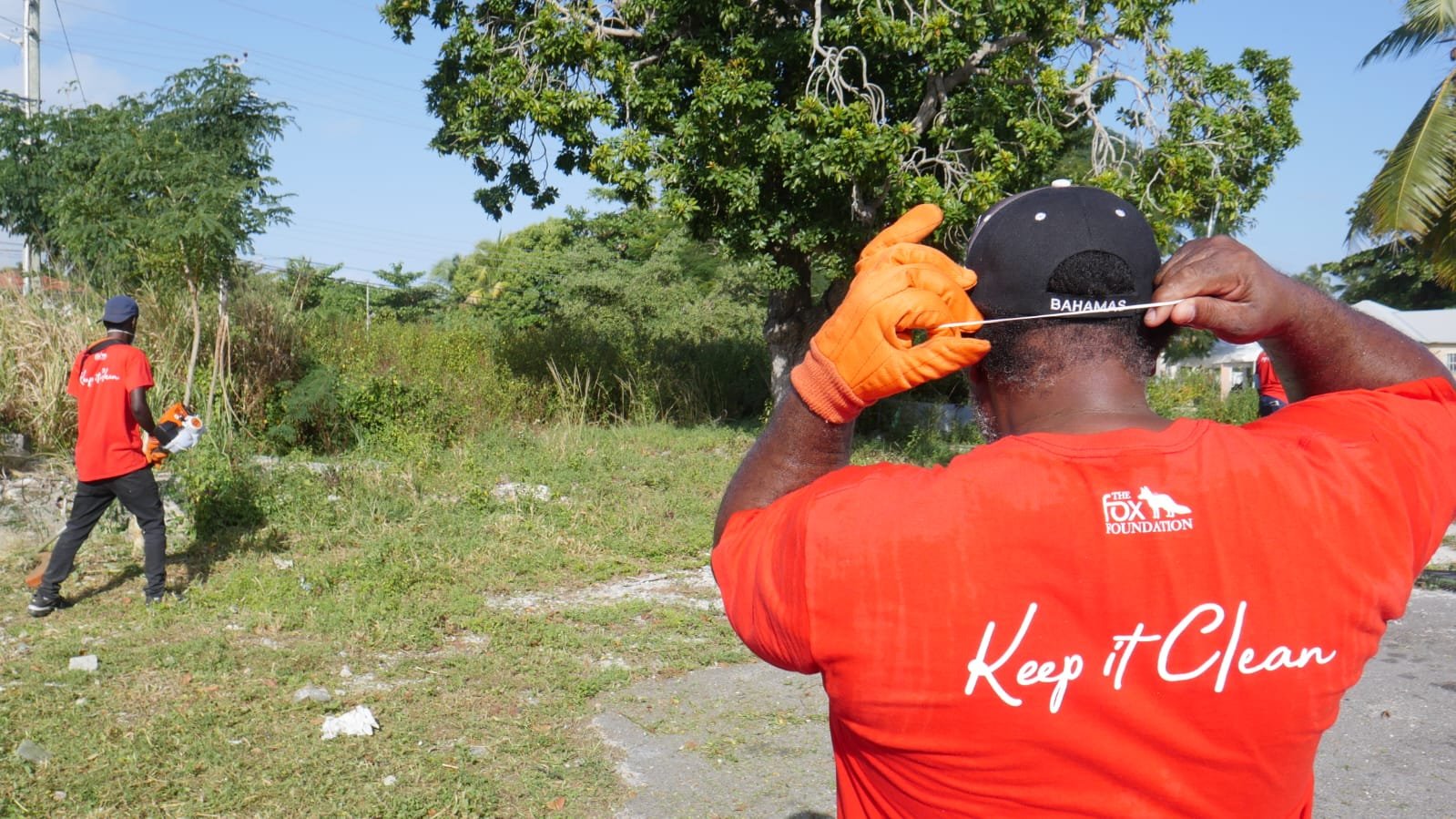 The Fox Foundation volunteers cleaning up the Kemp Road Community.